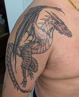 Shoulder Dragon — Illustrative tattoo by KK